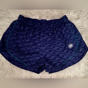 Selling Nike shorts size large beautiful purple color.